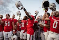 Ball State football sings its fight song to the crowd after defeating Central Michigan 24-17 Oct. 21 at Scheumann Stadium. The win marked the Cardinals' first Mid-American Conference victory of the season. Dalton Clark, DN