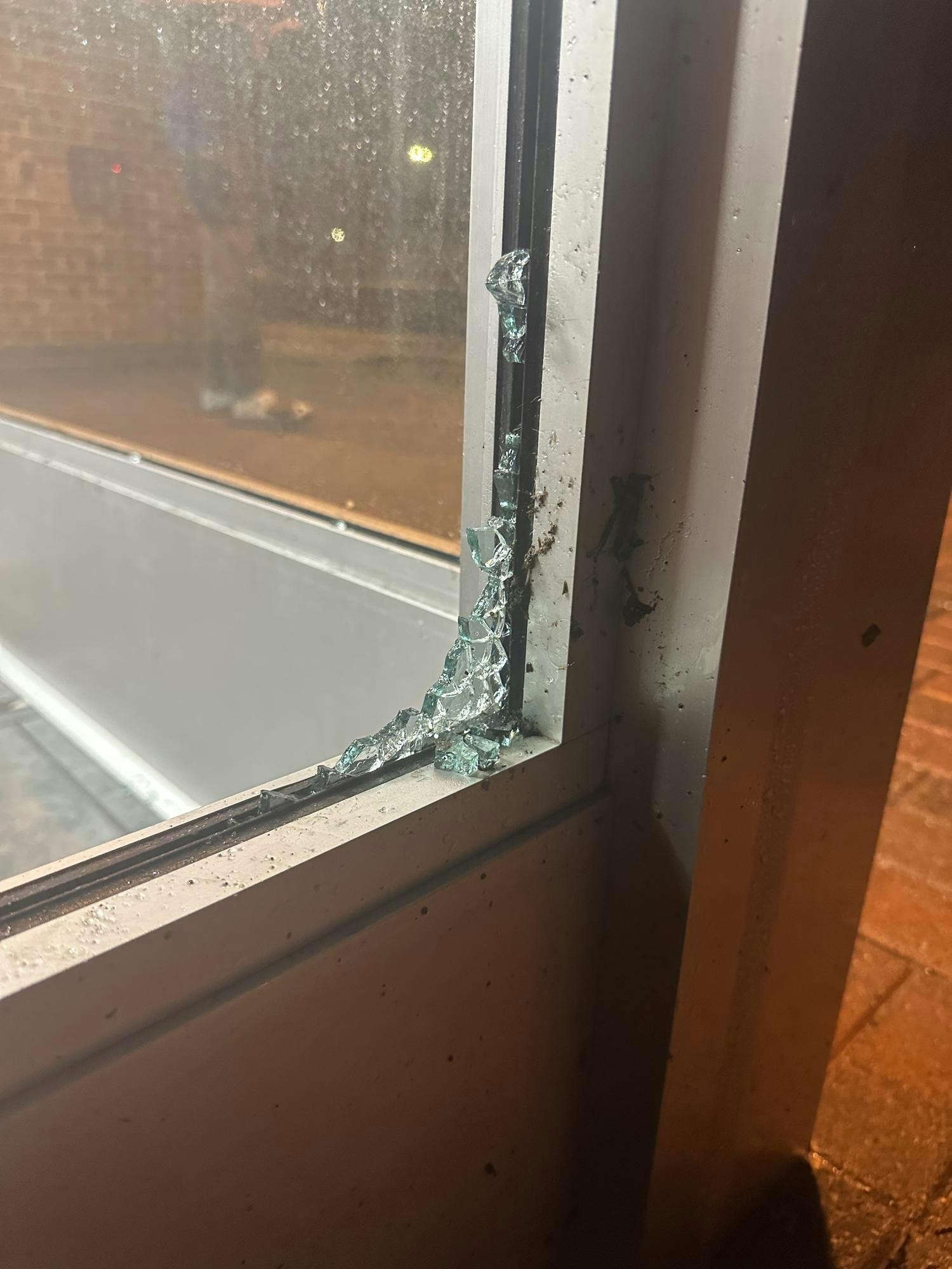 A window that was shattered due to severe weather on Ball State's campus.