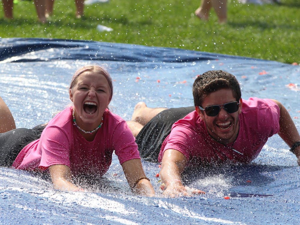 Ball State students attend Delta Theta Delta and Alpha Chi Omega's annual Watermelon Bust outside Worthen Arena Saturday, Sept. 11. Jacy Bradley, DN