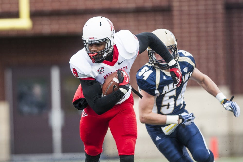 Sophomore wide receiver Jordan Williams makes a push down field against the University of Akron on Oct. 26 at InCision Stadium. Williams had the top yards receiving against Akron with 124. DN PHOTO JONATHAN MIKSANEK