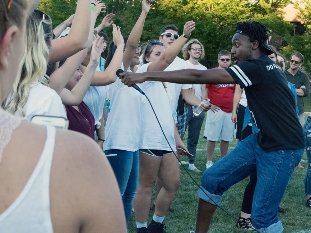 Rapper LJ III encourages his audience to chant some of his lyrics during Bonnamu on Sept. 15 at LaFollette Field. The winner of the battle wond a free recording session. Rachel Ellis, DN