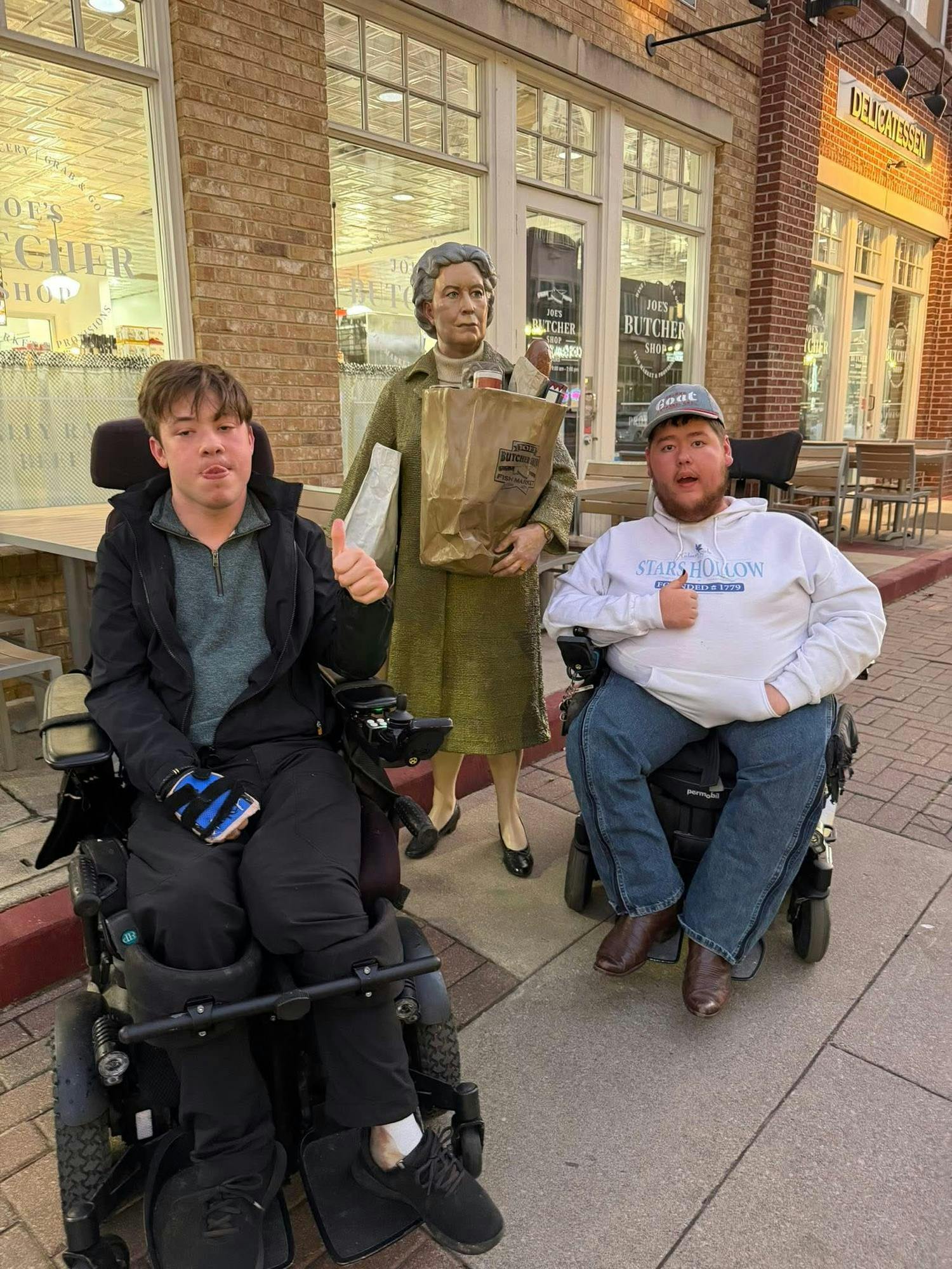 Dillon Rosenlieb and James Nichols pose by a monument in Carmel, Indiana October 2025; Photo Provided by James Nichols