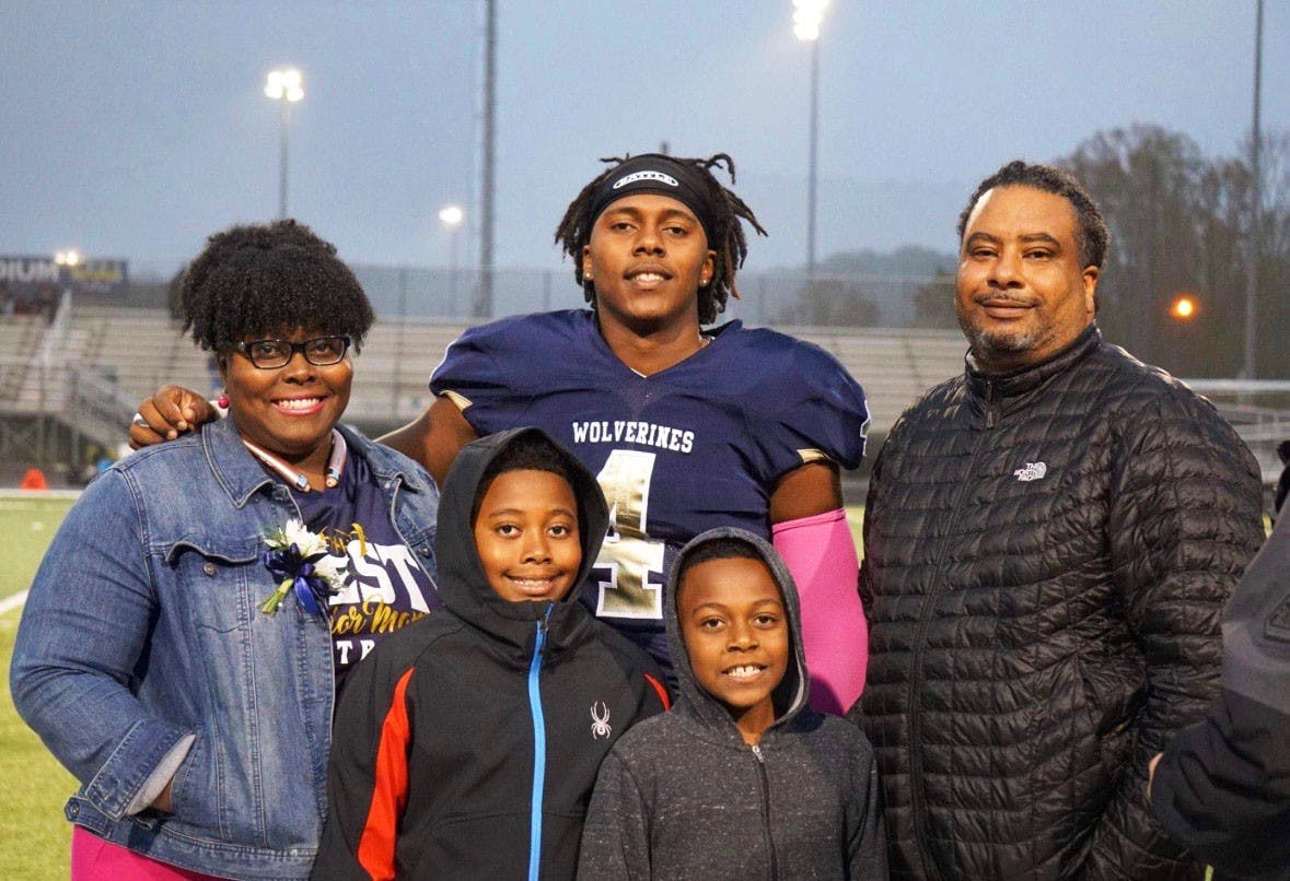 Mikhari Sibblis with his two brothers, mother, and father at West Forsyth High School. Sibblis went on to play at Lehigh University. Litisha Slibblis, photo provided