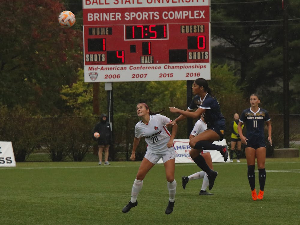 Junior defender Maya Millis wins a header in a game against Kent State Oct 5 at Briner Sports Complex. Andrew Berger, DN