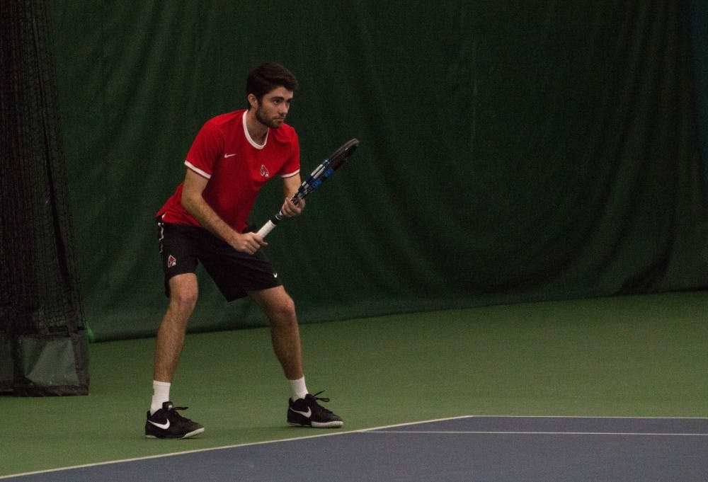 Ball State tennis players Tom Carney and Matt Helm play against Eastern Illinois players Jared Woodson and Freddie Ammer in the match on Jan. 22 at Muncie's Northwest YMCA. The Cardinals won 6-1. Grace Ramey // DN
