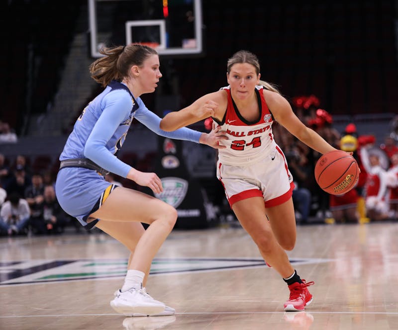 Junior Madelyn Bischoff dribbles the ball down court against Kent State March 15 at Rocket Mortgage FieldHouse in Cleveland, Ohio. Bischoff scored 10 points in the game. Mya Cataline, DN