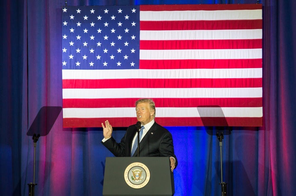 President Donald Trump speaks in the Farm Bureau Building on Sept. 27 at the Indianapolis State Fairgrounds. Special counsel Robert Mueller warned individuals in President Donald Trump’s orbit that lying about contacts between the president’s campaign and Russians could cause them to get federal criminal charges. Kaiti Sullivan, DN File &nbsp;