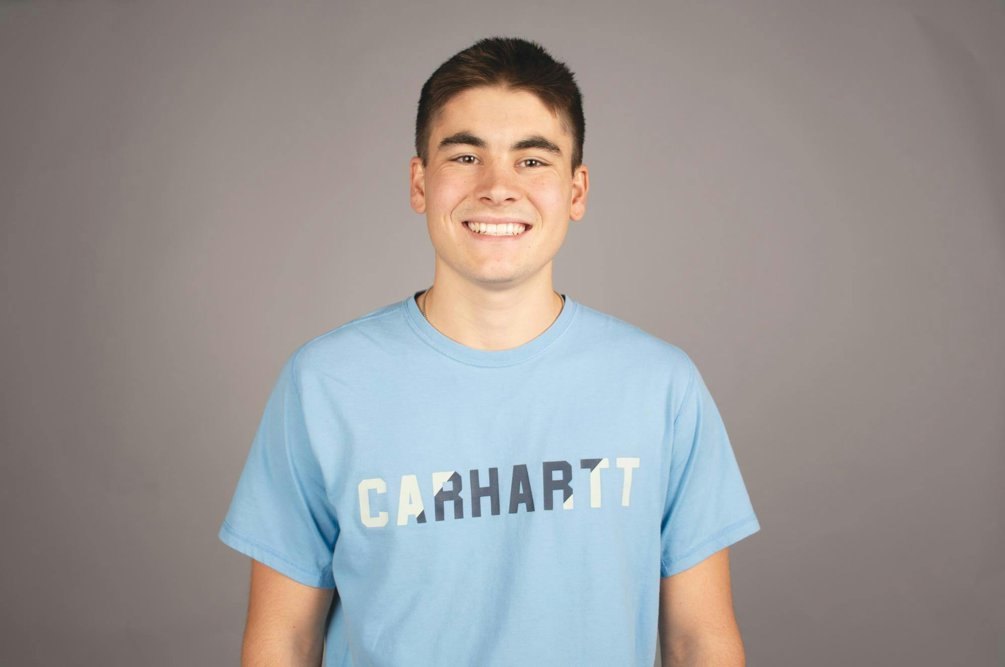 Micah Hess poses for a photo Nov. 20 in the Arts and Journalism Building. Kadin Bright, DN