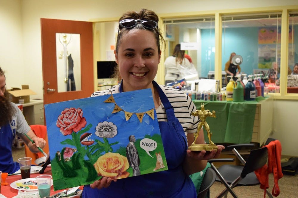 <p>Desiree Soptelean, a Ball State alumna, frequently attends&nbsp;Bad Art Night events.&nbsp;Bad Art Night, which will return to Muncie's&nbsp;Maring-Hunt Library on Dec. 6, allows community members aged 18 and over to enjoy a stress-free night of art.&nbsp;<i style="background-color: initial;">Rebecca Parker // Photo Provided</i></p>