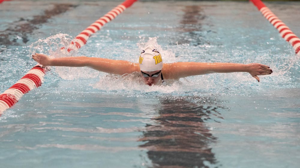 Senior Duda Sales in the middle of a butterfly stroke Jan. 16, 2020, in Lewellen Aquatic Center. This is Duda's senior year swimming for Toledo. Joshua Smith, DN