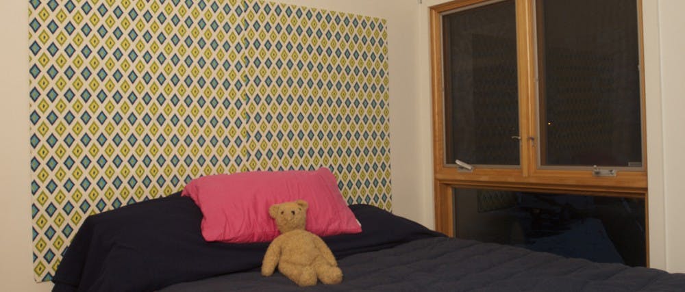 A headboard made of washi tape is displayed Jan. 31 at Scheidler Apartments. DN PHOTO MARCEY BURTON