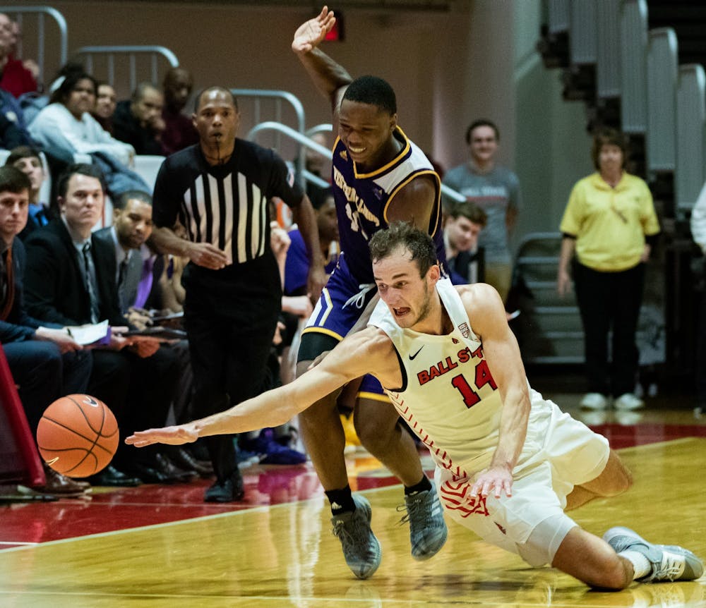 Senior forward Kyle mallers dives for a ball Nov. 26, 2019, at John E. Worthen Arena. Mallers had 12 points against Western Illinois. Jacob Musselman, DN