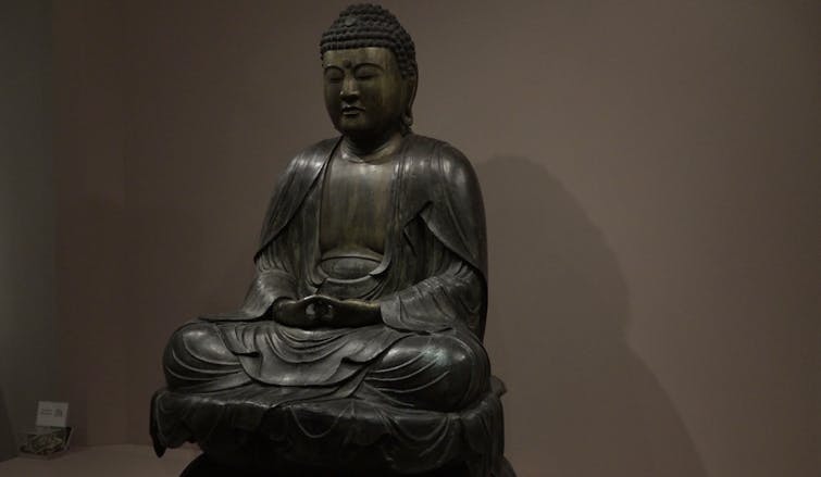 A statue on display in the David Owsley Museum of Art.