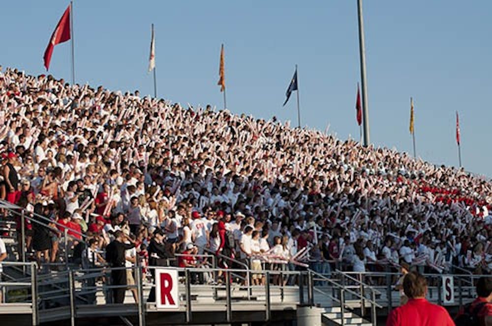The student section of Scheumann Stadium fills up with students for an evening game against Southern Flordia on Sept. 22, 2012. Attendance for the games went up 63 percent in the 2012 season. DN FILE PHOTO JON MIKSANEK