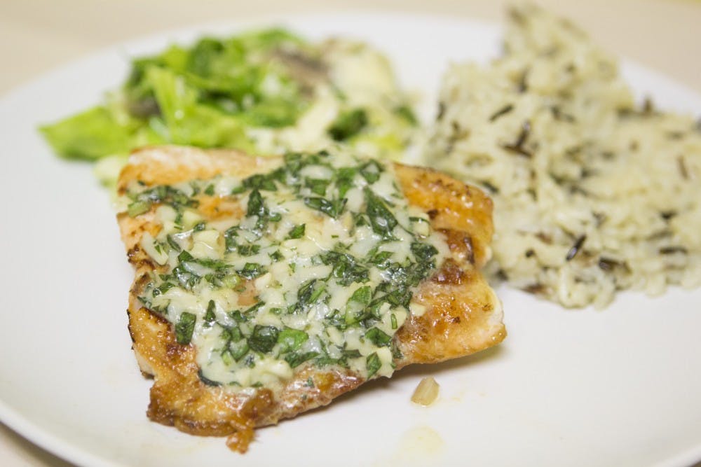 <p>Basil and salmon is a good dinner for the winter. &nbsp;There are only six ingredients for this recipe. Emma Rogers // DN&nbsp;</p>