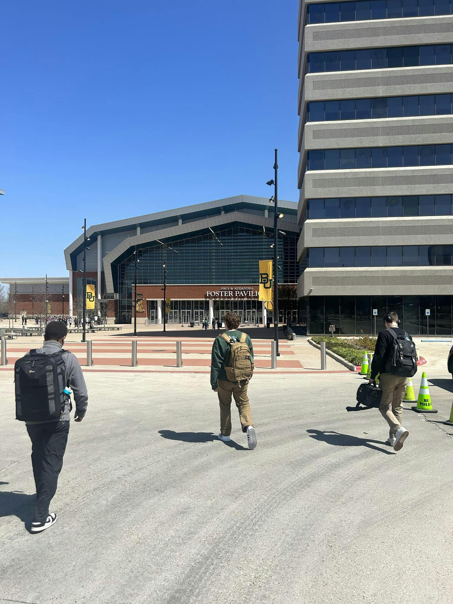 Titus Slaughter, Elijah Poe and Andrew Berger walk to the Foster Pavilion. Max Robson, NewsLink Indiana
