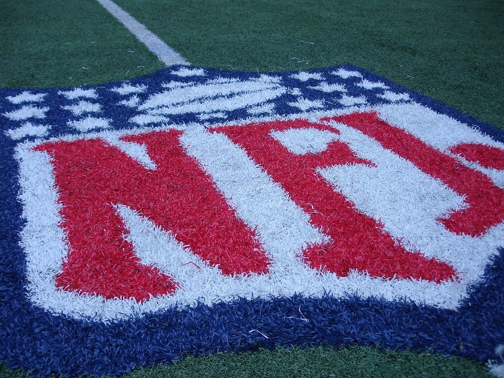 The National Football League logo in the turf. The National Football League was founded in 1920. Jonathan Moreau, photo courtesy