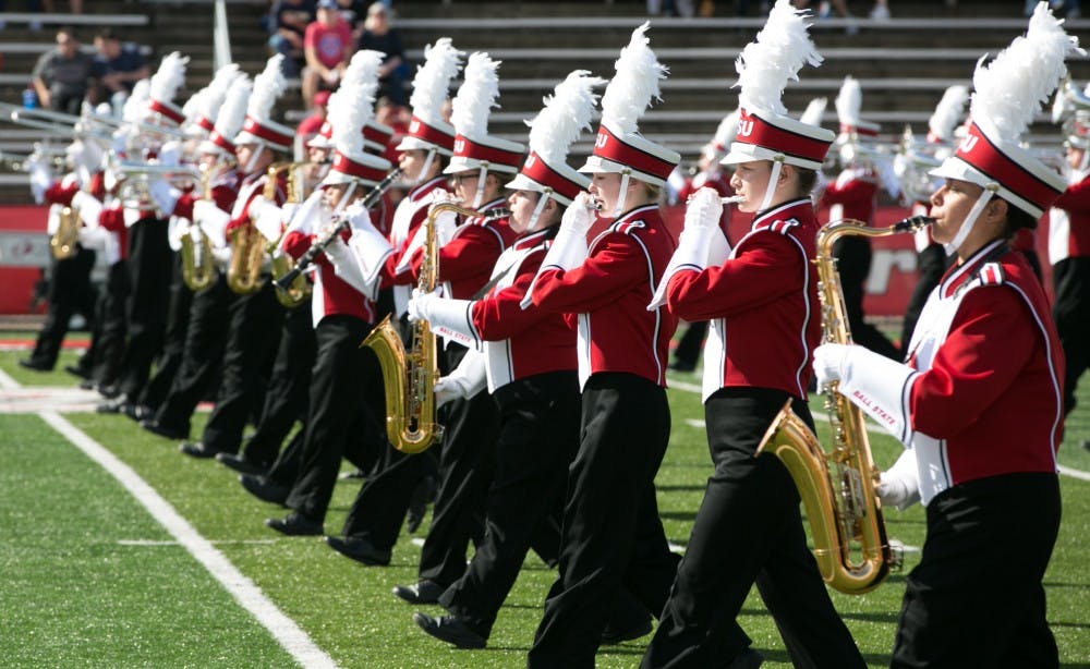 The Pride of Mid-America marching band performs the opener to the homecoming game on Oct. 21 against Central Michigan in Scheumann Stadium. The Cardinals had a hard loss of 56-9. Kaiti Sullivan, DN