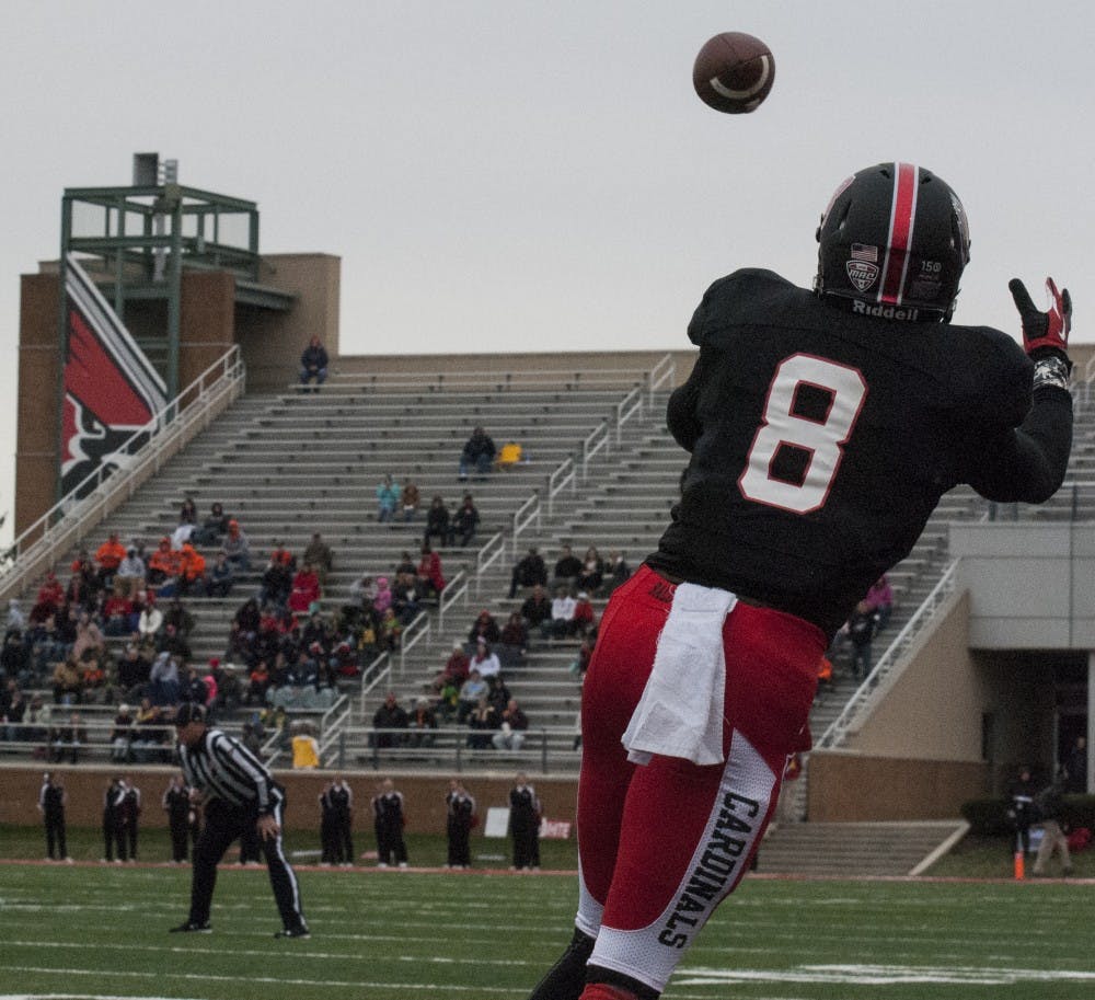 Senior wide receiver Jordan Williams catches the ball for a complete pass on Saturday Oct. 31 at the Ball State vs. University of Massachusetts game. DN PHOTO ALLISON COFFIN