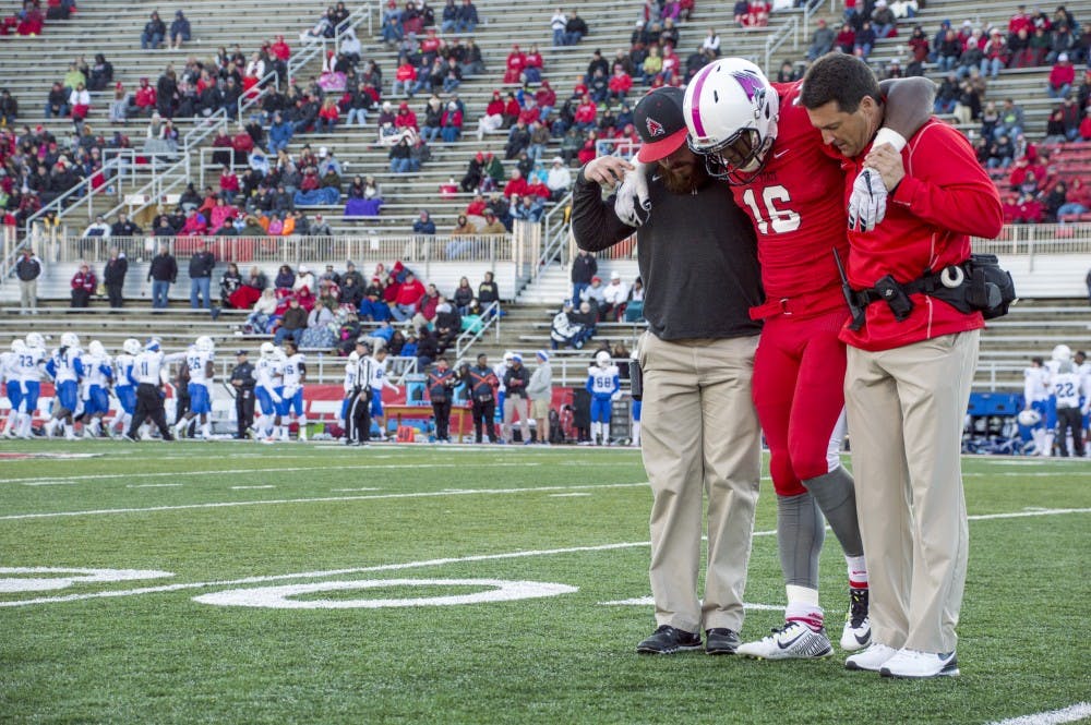 Ball State football trainers help junior wide receiver KeVonn Mabon off the field during the football game against Georgia State on Oct. 17 at Scheumann Stadium. DN PHOTO ALAINA JAYE HALSEY