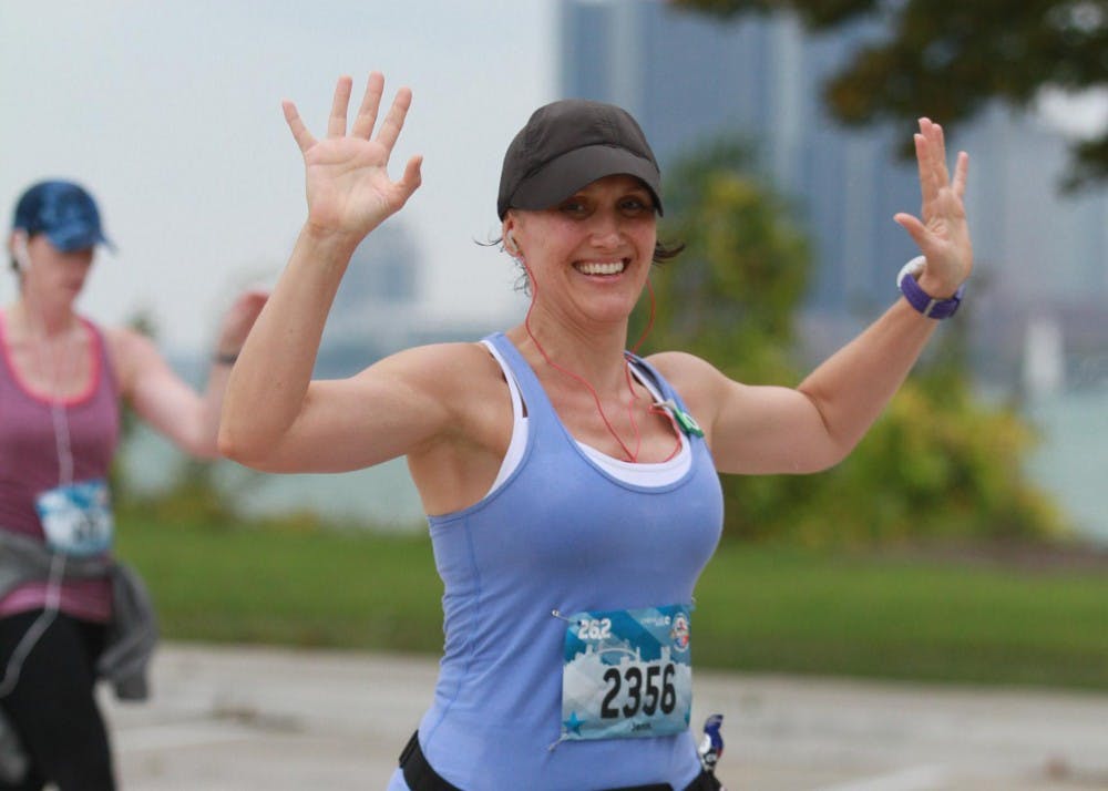 <p>Ball State alumna Jennifer Courtney races in the 2017 Detroit Marathon. Courtney has participated in 19 marathons and will be running another in Paris on April 8. <strong>Jennifer Courtney, Photo Provided</strong></p>