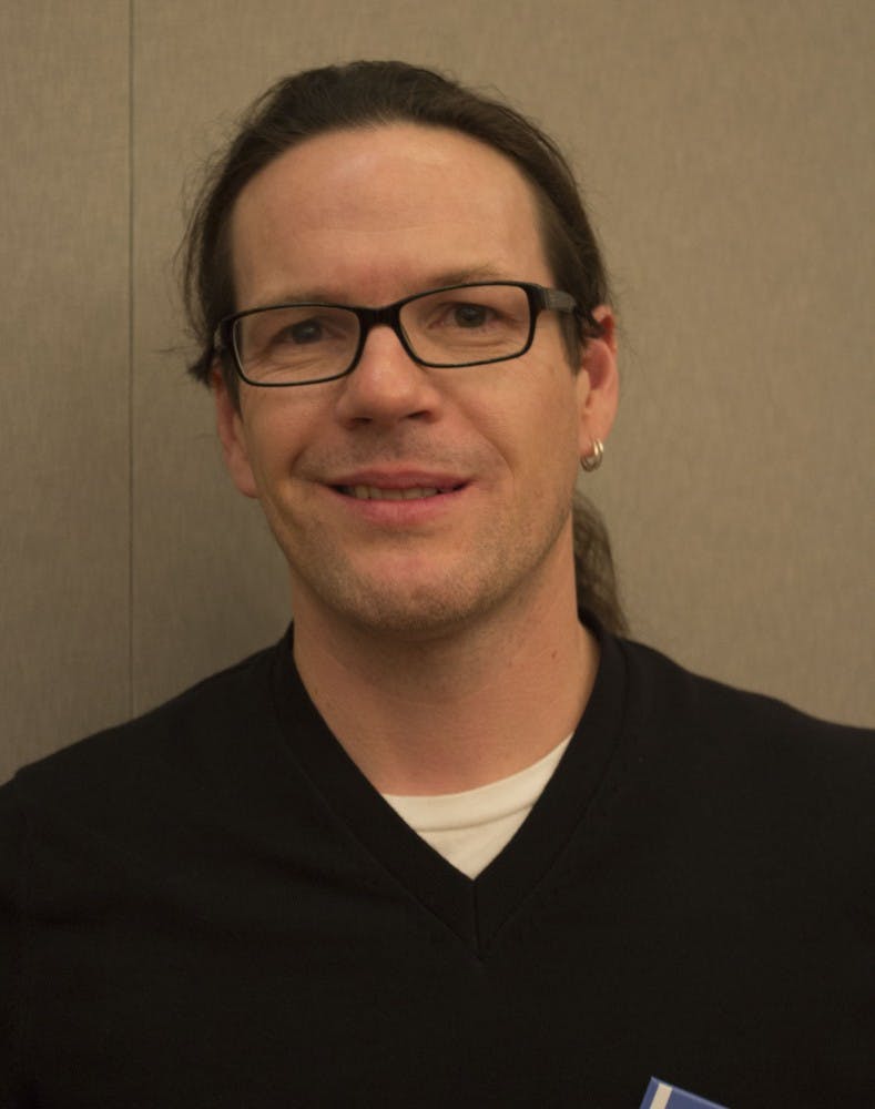 Sean Lovelace, an associate professor of English, started off the In Print Festival of First Books on Tuesday evening at the Alumni Center. DN PHOTO ANDREW KELLY