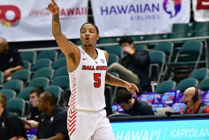 Junior guard Ishmael El-Amin calls out who he's defending in a game against Portland on Dec. 25 in Honolulu, Hawaii at the Diamond Head Classic. The Cardinals defeated the Pilots, 61-46. Ball State Athletics, photo provided