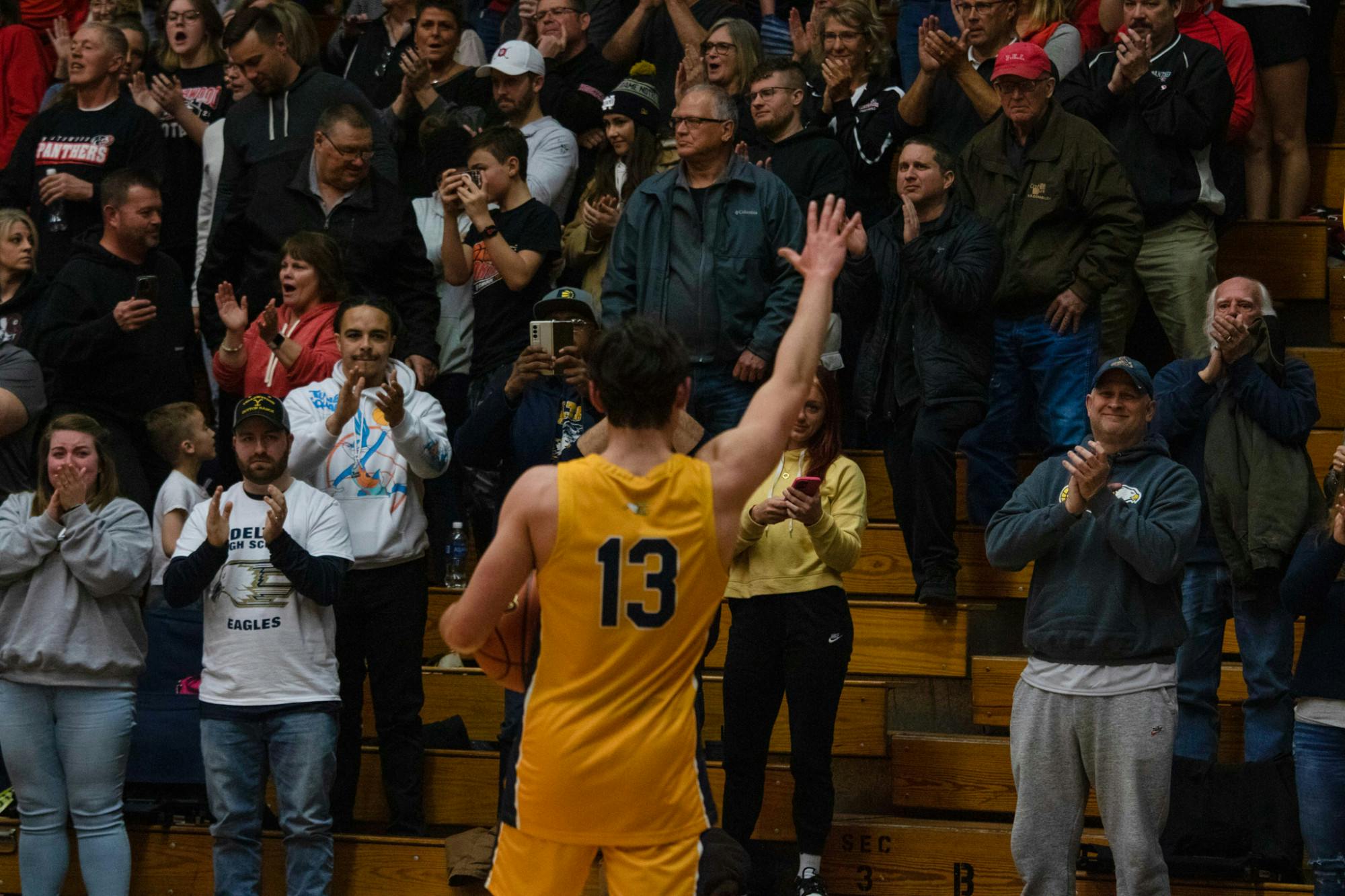 Delta senior Blake Jones bids farewell to the crowd at the Class 3A semi-state contest against Northwood March 18. Zach Carter, DN
