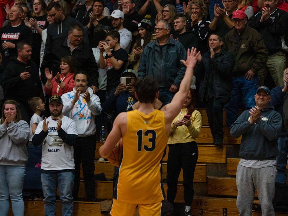 Delta senior Blake Jones bids farewell to the crowd at the Class 3A semi-state contest against Northwood March 18. Zach Carter, DN

