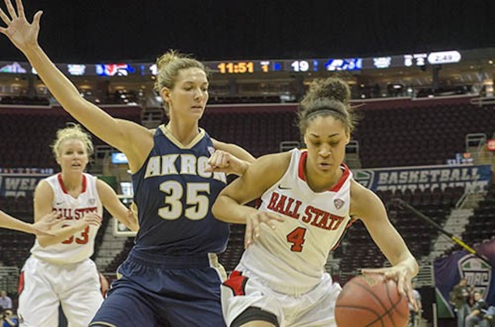 Nathalie Fontaine drives towards the paint in order to score for Ball State. The score at the half is 29-40. DN PHOTO COREY OHLENKAMP