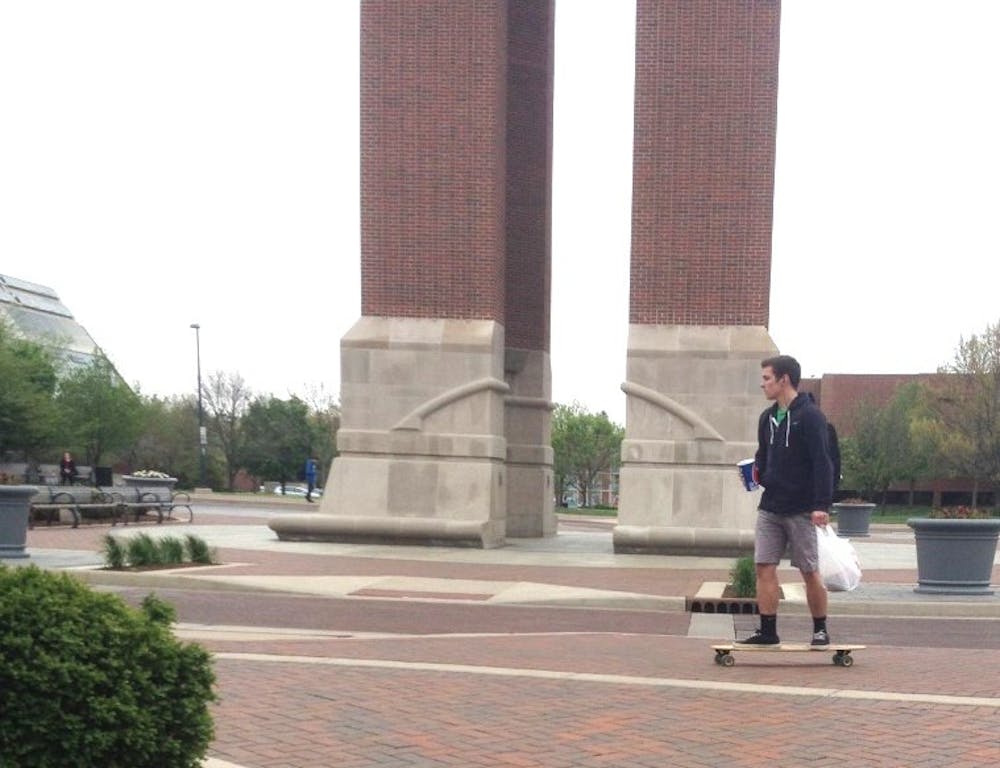 <p>Skateboarding is not prohibited on campus, but many students do not know that. Students can receive citations for skateboarding on campus, but they say it's not taking it seriously. <em>DN PHOTO ALLIE KIRKMAN</em></p>
