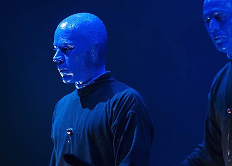 Blue Man Q&A - Russell Rinker of the Blue Man Group looks out on the audience in John R. Emens Auditorium during a break in the music on Tuesday. Rinker has been an off-and-on member of the show for 10 years. This is his first national tour. DN FILE PHOTO BOBBY ELLIS