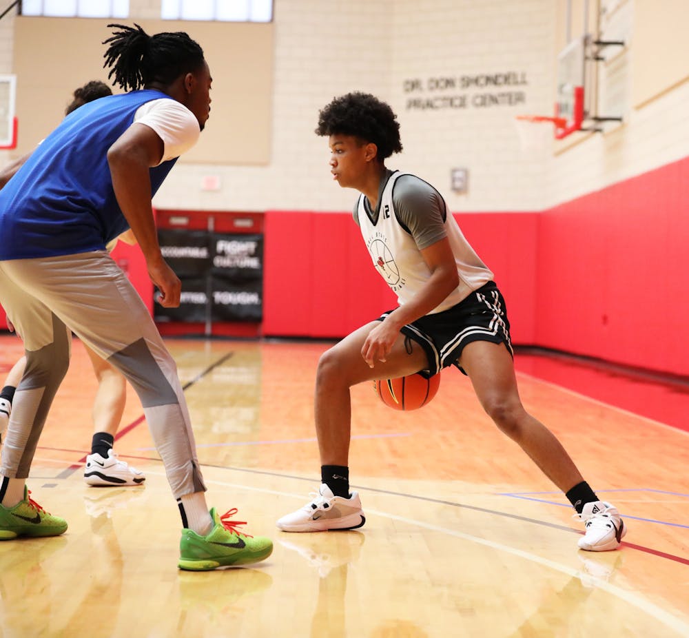 Junior Nyla Hampton dribbles the ball at a defending player during a practice Oct. 26 at Shondell Practice Center. Mya Cataline, DN