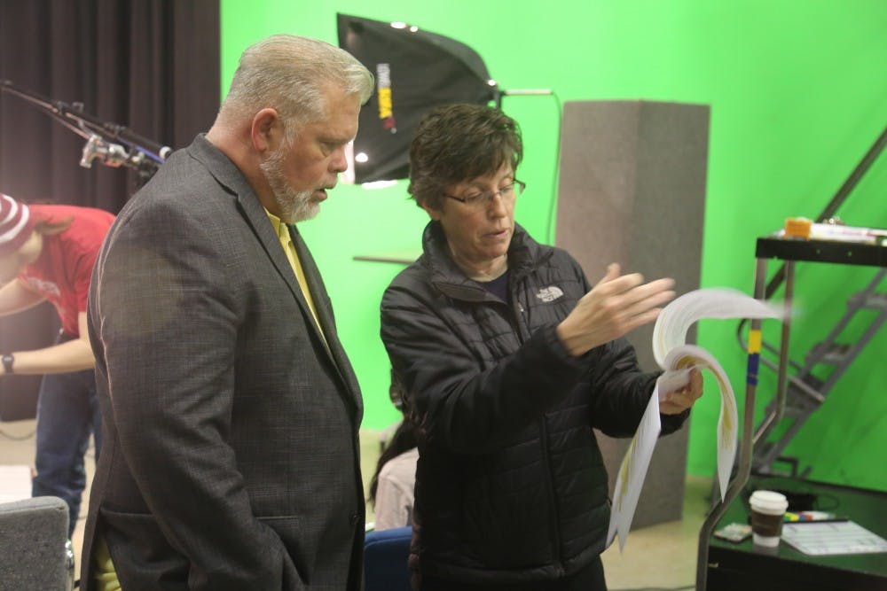 Elizabeth Agnew, professor of religious studies, reviews questions with Richard McKinney, former president of the Islamic Center of Muncie, for the "Muslims in Muncie" documentary. Agnew said the documentary focused more on making the entire&nbsp;community the protagonist instead of particular individuals.&nbsp;Elizabeth Agnew, Photo Provided.