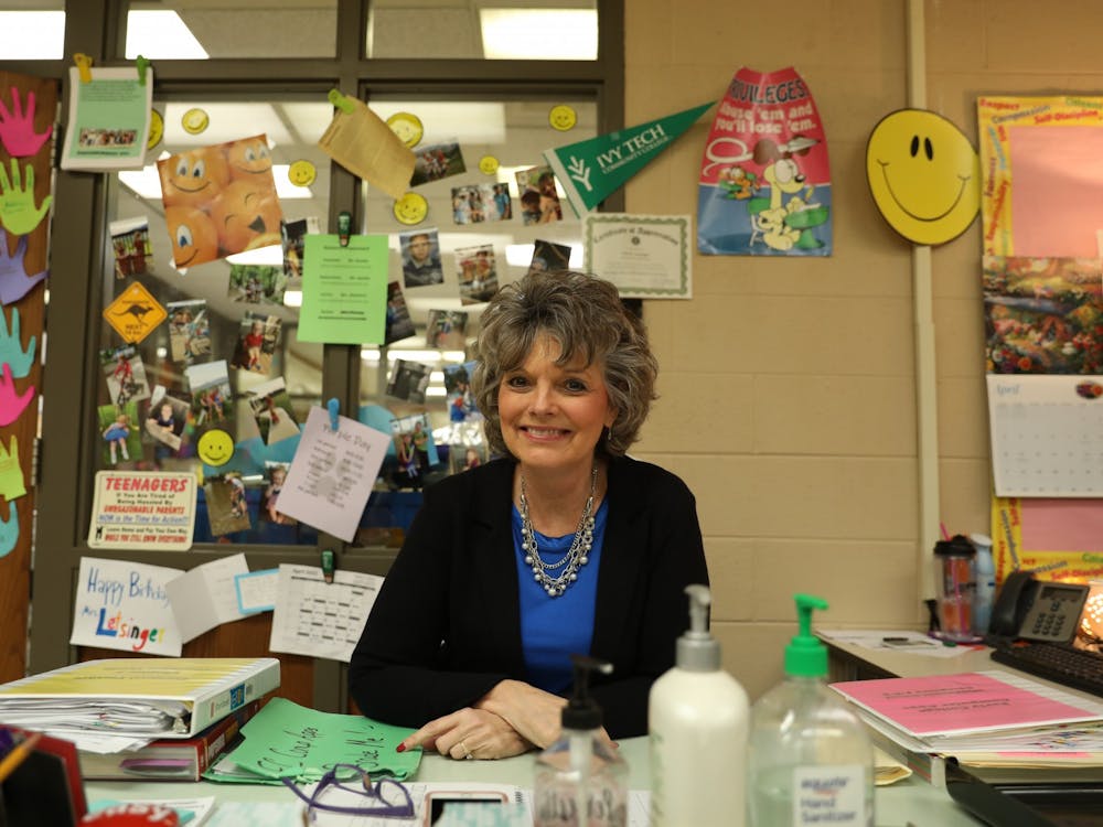 Lisa Letsinger poses for a photo in her classroom April 5 at Muncie Central High School. Letsinger is retiring in 2022 and plans to spend more time with her daughter and grandchildren in Australia. Rylan Capper, DN