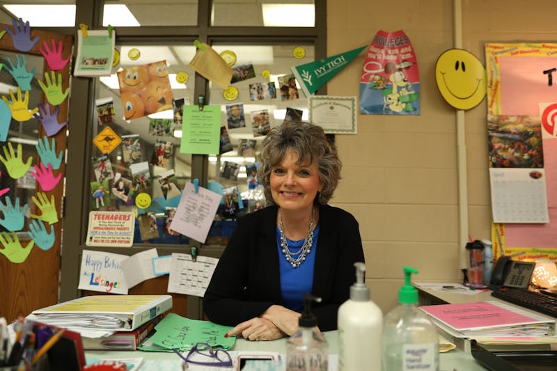 Lisa Letsinger poses for a photo in her classroom April 5 at Muncie Central High School. Letsinger is retiring in 2022 and plans to spend more time with her daughter and grandchildren in Australia. Rylan Capper, DN