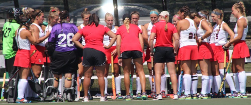 The Cardinals' field hockey team listens to their coach before their game against Ohio on Aug. 27 at Briner Sports Complex. The Cardinals' next home game is against Kent State on Oct. 6. Patrick Murphy // DN
