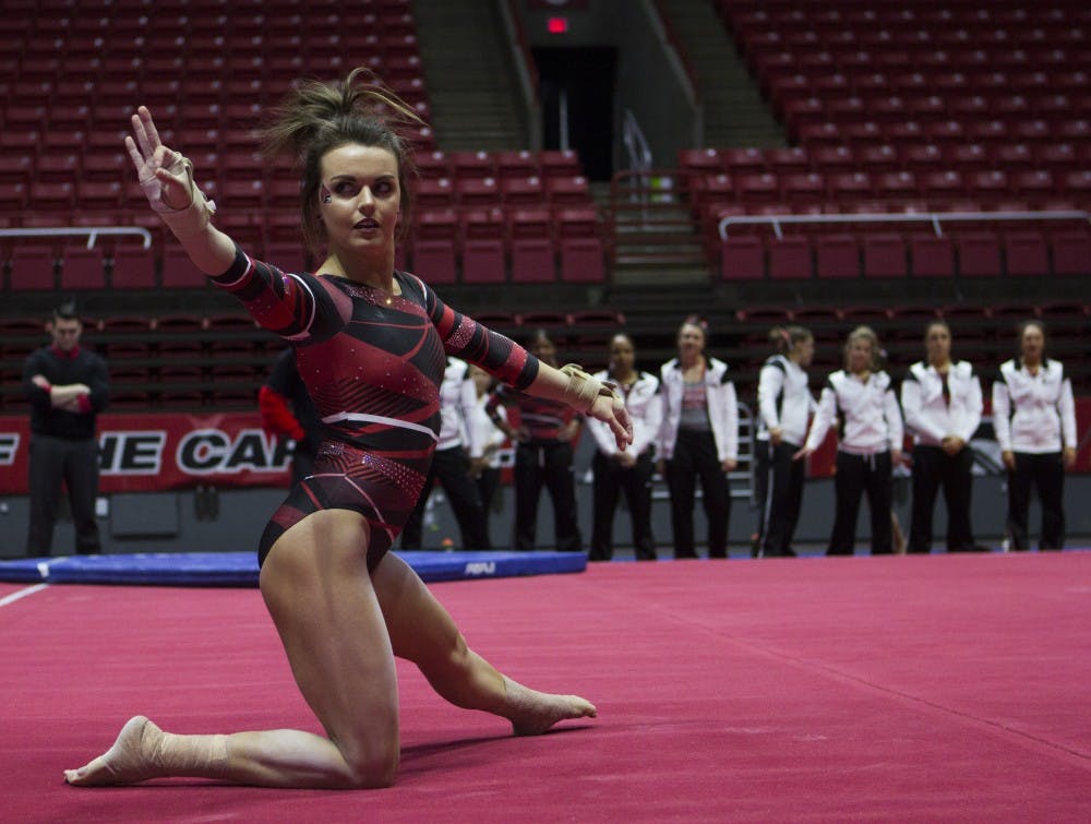 Junior Clare Collins performs her floor routine at the meet against Northern Illinois University on Jan. 15 at Worthen Arena. Emma Rogers // DN 