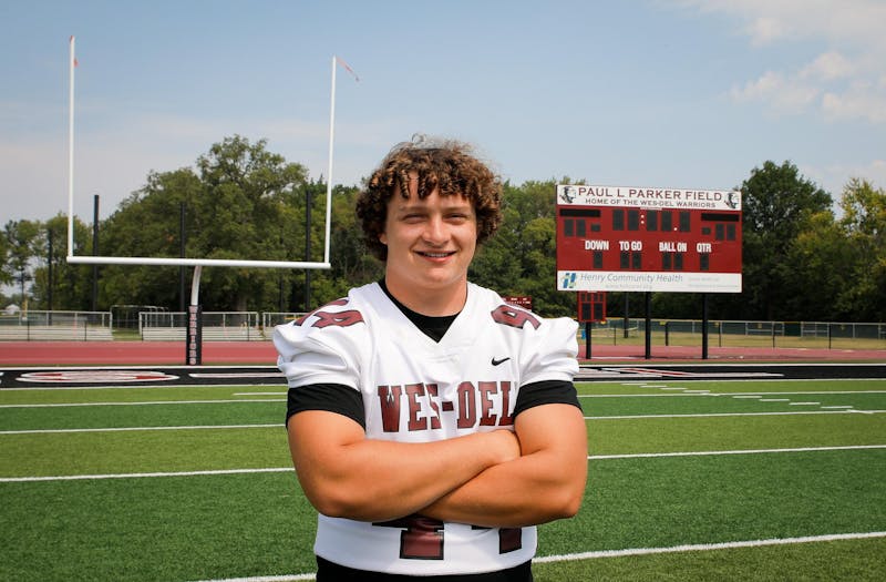 Wes-Del senior Grayson Mealy stands on Paull Parker Field Aug 30 at Wes-Del High School. Mealy is a three-sport athlete and an employee for the Indiana High School Athletic Association (IHSAA). Andrew Berger, DN 
