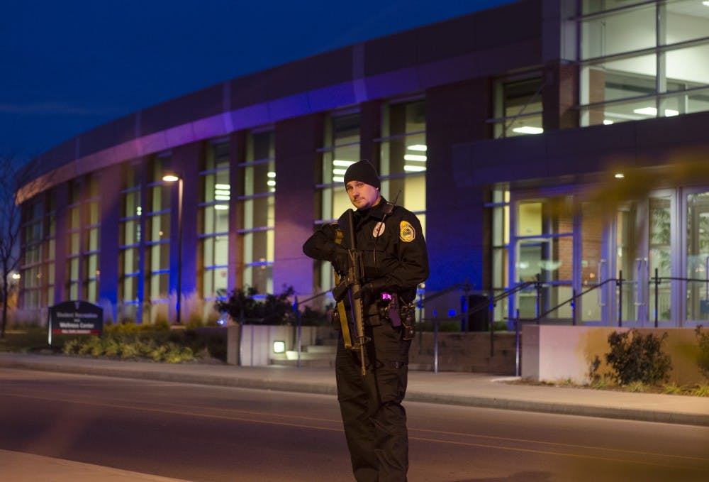 Police secure the Student Recreation and Wellness Center after a report of an armed assailant in the rec center. DN PHOTO COREY OHLENKAMP
