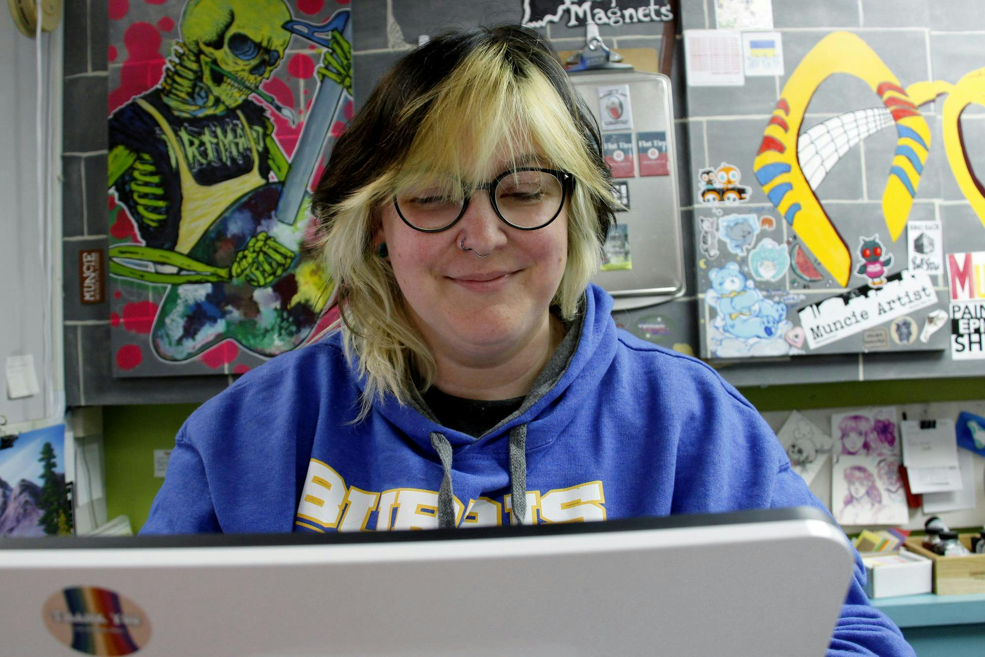 Art Mart general manager Elizabeth "Beth" McCollum works at Art Mart's front counter Sept. 4 in Muncie Ind. Beth said she is looking to add a yarn wall to the store's new and upcoming classroom space. Katherine Hill, DN
