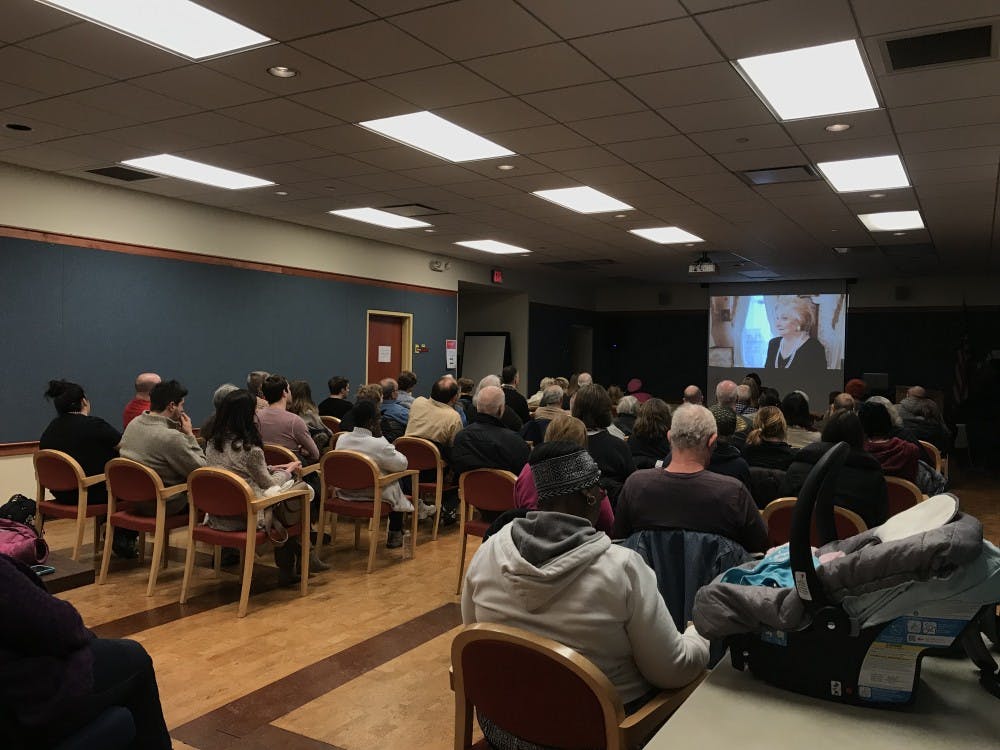 Community members gather in Maring-Hunt Public Library's Meeting Room on Saturday, Jan. 6, 2017, to watch a 48-minute screening of "Angry, White and American" a documentary by Gary Younge, editor-at-large for The Guardian. The documentary first premiered on Nov. 10, 2017, on Channel 4 in the United Kingdom. Mary Freda, DN