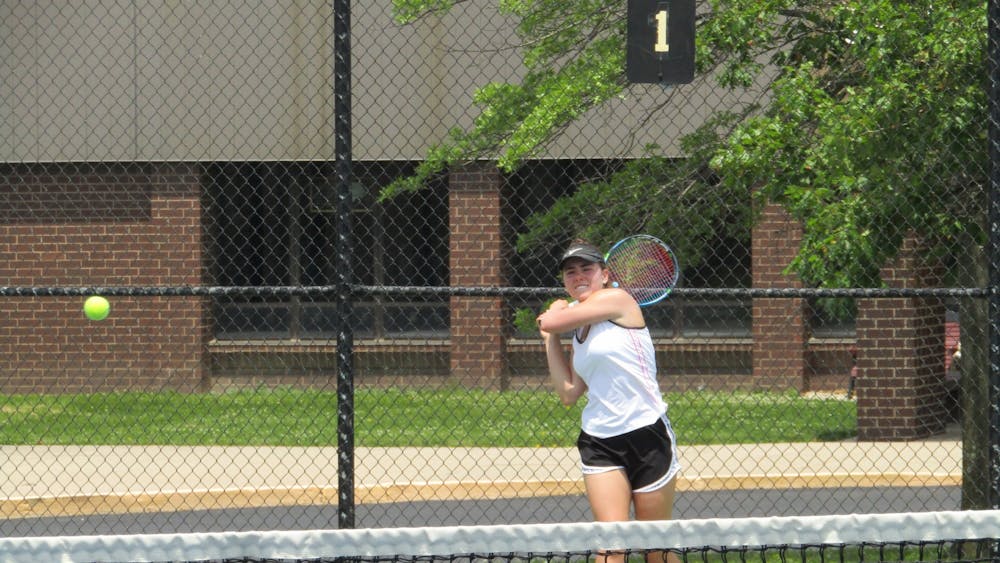 Delta girls tennis senior Gwendolyn Clark follows through on her return shot during the Eagles practice June 1, 2022 at Delta High School. Clark is Delta's No. 1 Singles player with 18 wins on the season. (Kyle Smedley/DN)