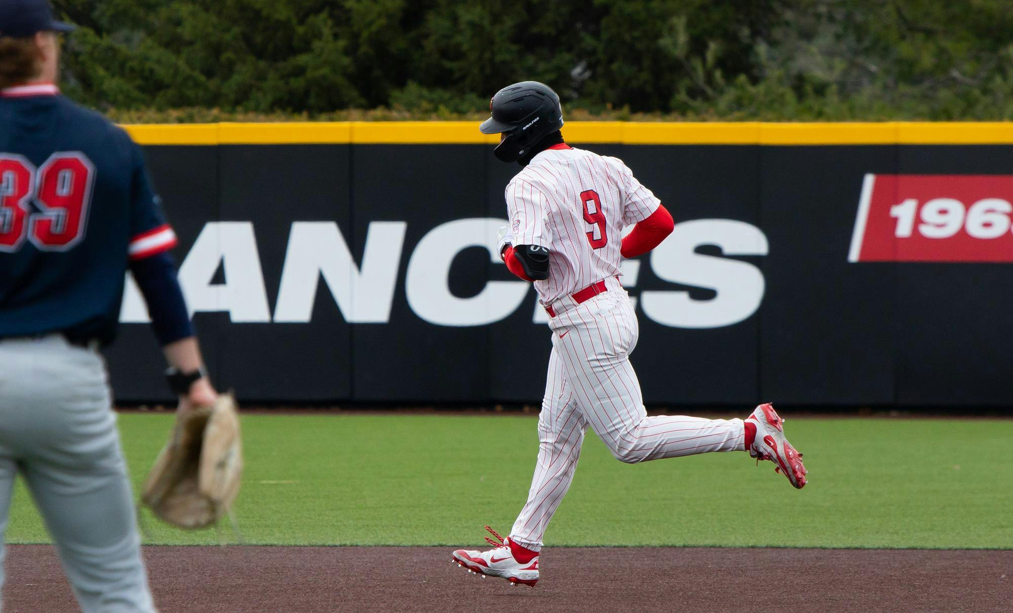 Junior outfielder runs the bases after hitting a home run March 25 at Shebek Stadium. Bevis started in all 59 games last season. Isabella Kemper, DN