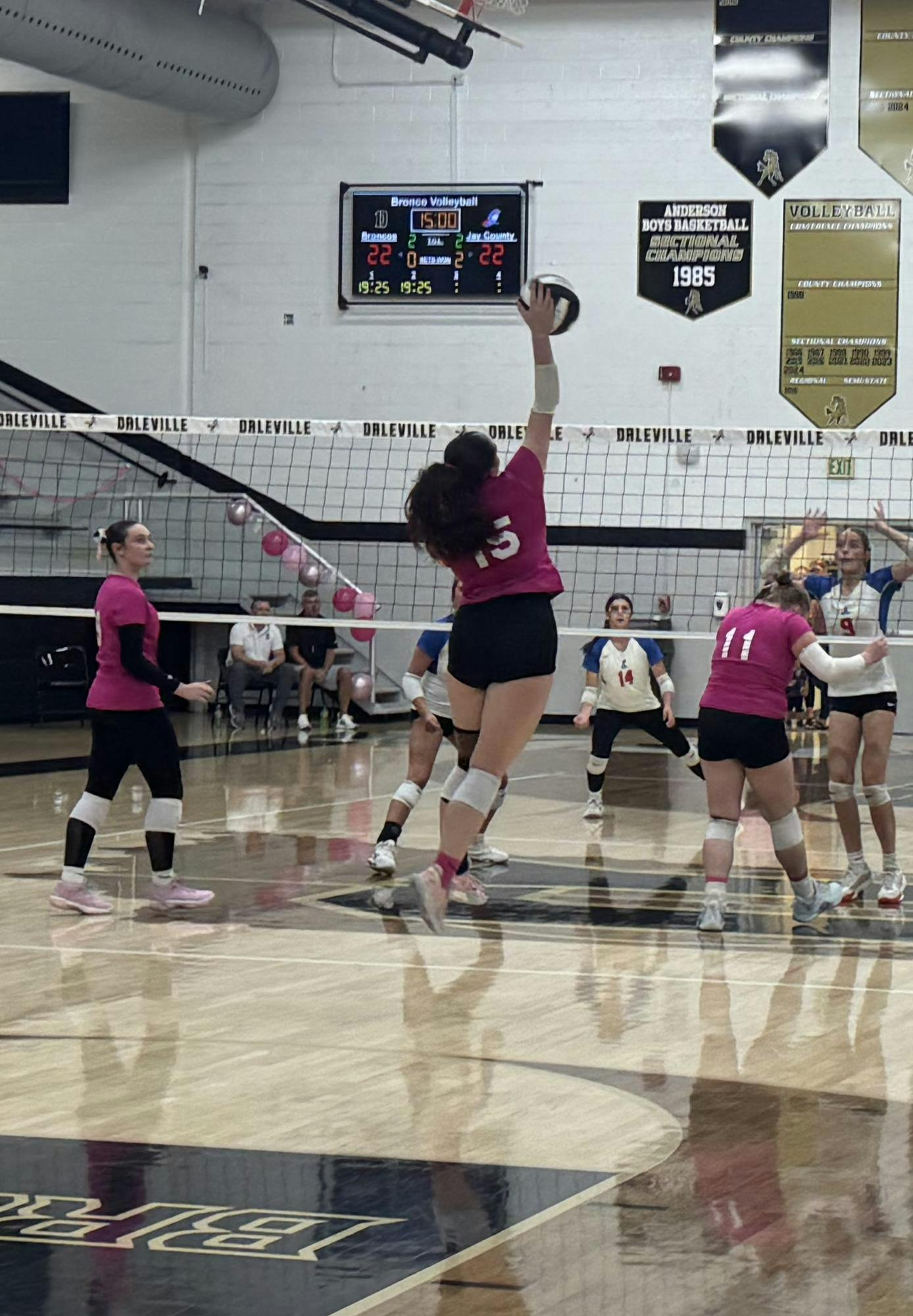 Daleville junior Maddie Rees hits the ball in a match against Jay County at Daleville High School on Oct. 6, 2025. Rees leads the Broncos in kills on the season with 311. PHOTO BY DAVID MOORE
