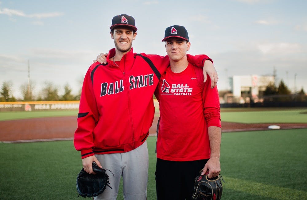 <p>Brothers Cody and Seth Freed after practice at Ball Diamond at First Merchants Ballpark Complex on Feb. 27. <strong>Reagan Allen, DN</strong></p>