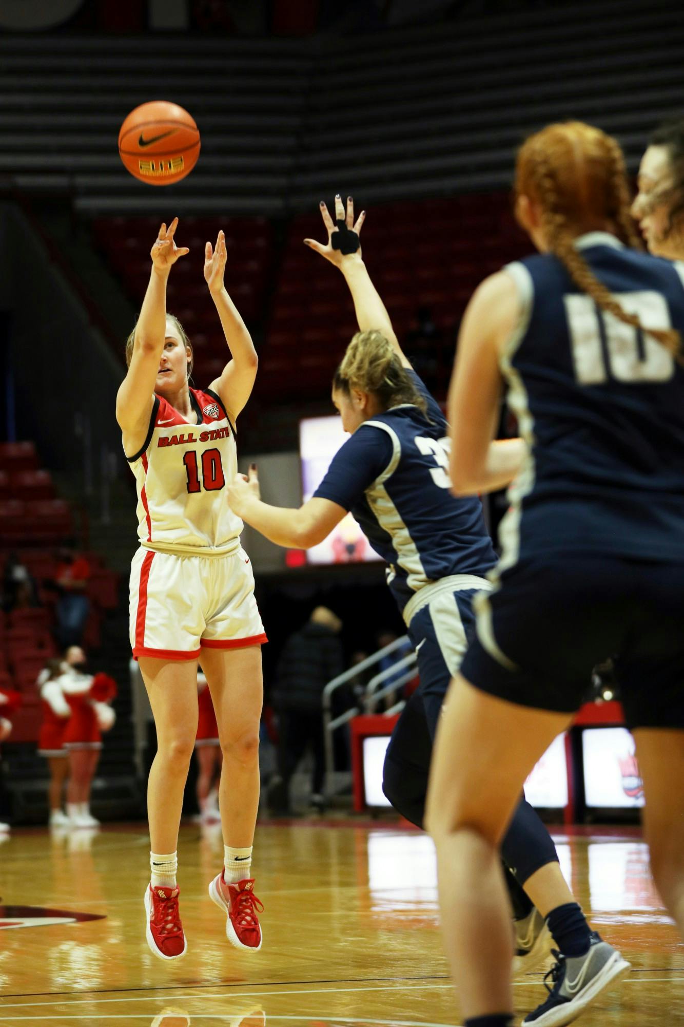 Senior Thelma Dis Agustsdottir (10) attempts to shoot a basket during the game against Utah State on Dec. 11, 2021, at Worthen Arena in Muncie, Indiana. Dis Agustsdottir scored 12 points during the game. Amber Pietz, DN