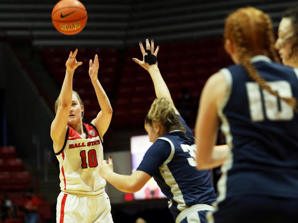 Senior Thelma Dis Agustsdottir (10) attempts to shoot a basket during the game against Utah State on Dec. 11, 2021, at Worthen Arena in Muncie, Indiana. Dis Agustsdottir scored 12 points during the game. Amber Pietz, DN