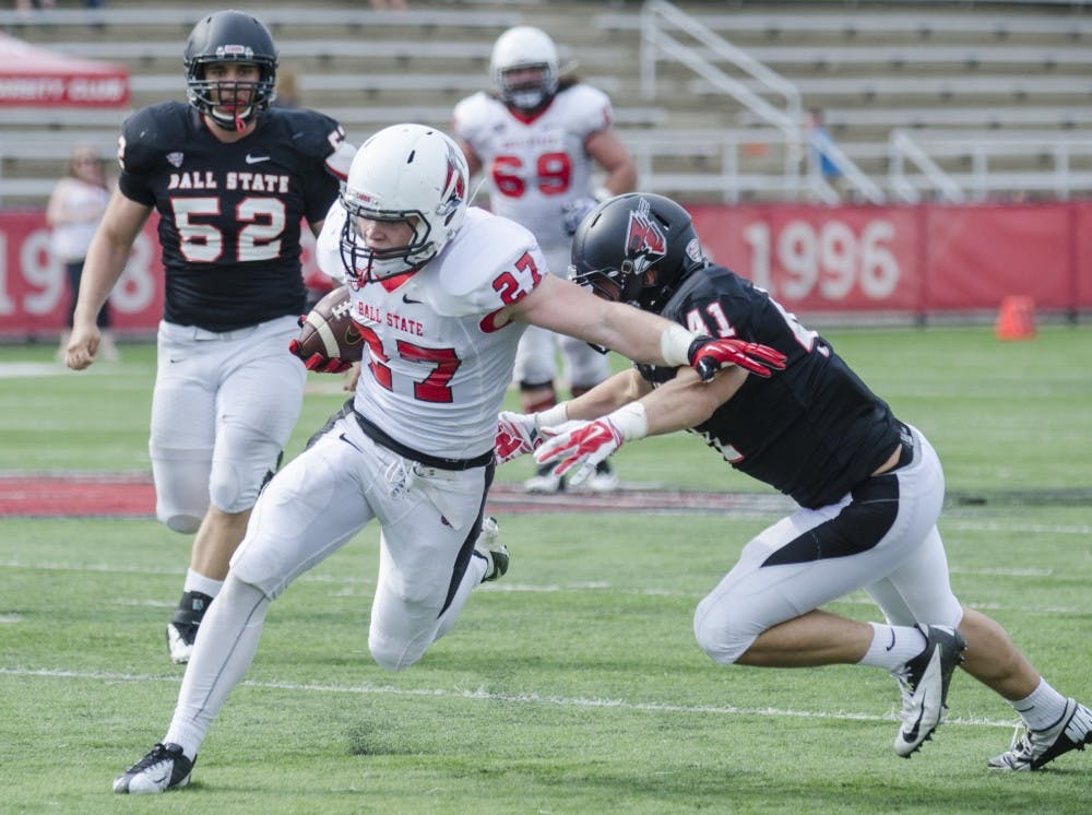 The Ball State football team hosted it's spring game on April 18 at Scheumann Stadium. Family members and friends were welcomed onto the field after the game. DN PHOTO BREANNA DAUGHERTY