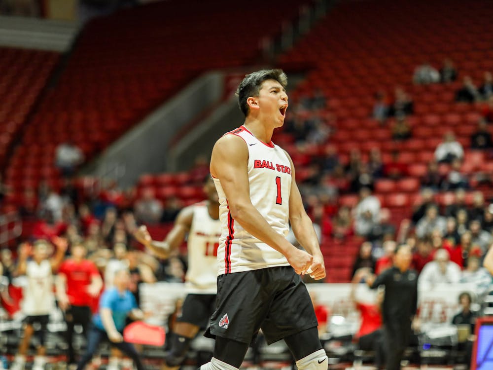 Fourth-year setter David Flores exclaims after Ball State scores in a game against Ohio State on March 15 at Worthen Arena. Flores had 31 assists. Katelyn Howell, DN